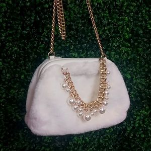 White fluffy purse (faux fur)with pearls and a gold chain